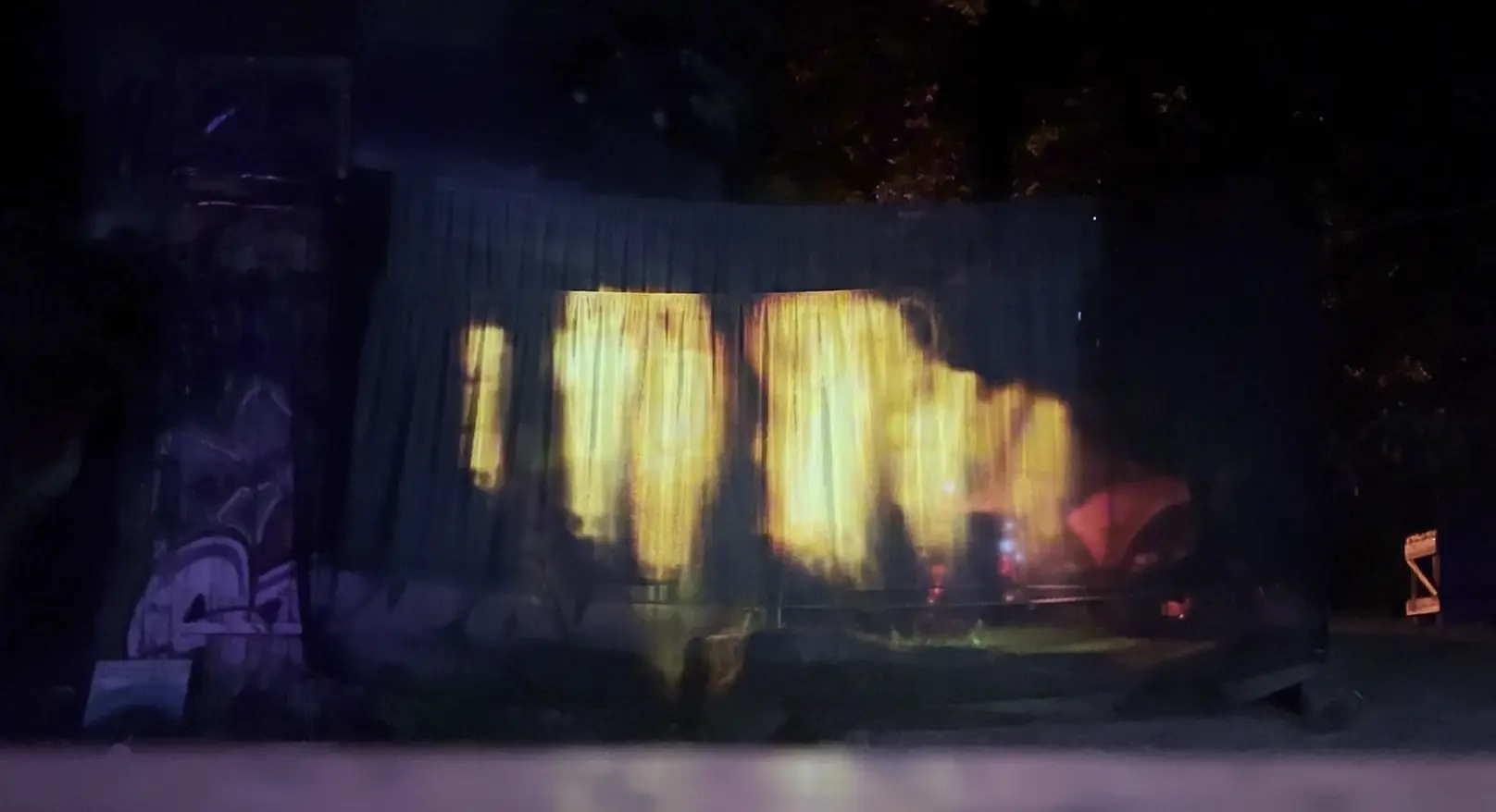 Motion Mirror projected onto fabric screens at night during the Lichtung Festival